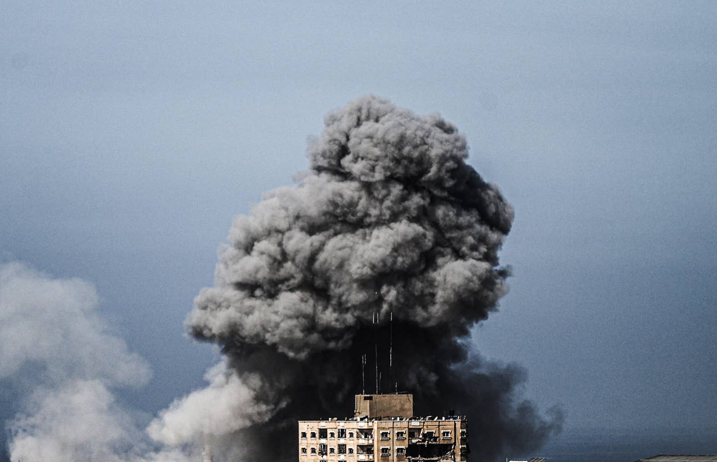 Smoke rises following an Israeli airstrike in Tel al-Hawa neighborhood, where buildings are heavily damaged or collapsed in Gaza City, Gaza on November 9, 2023. (Photo by Ali Jadallah/Anadolu via Getty Images)