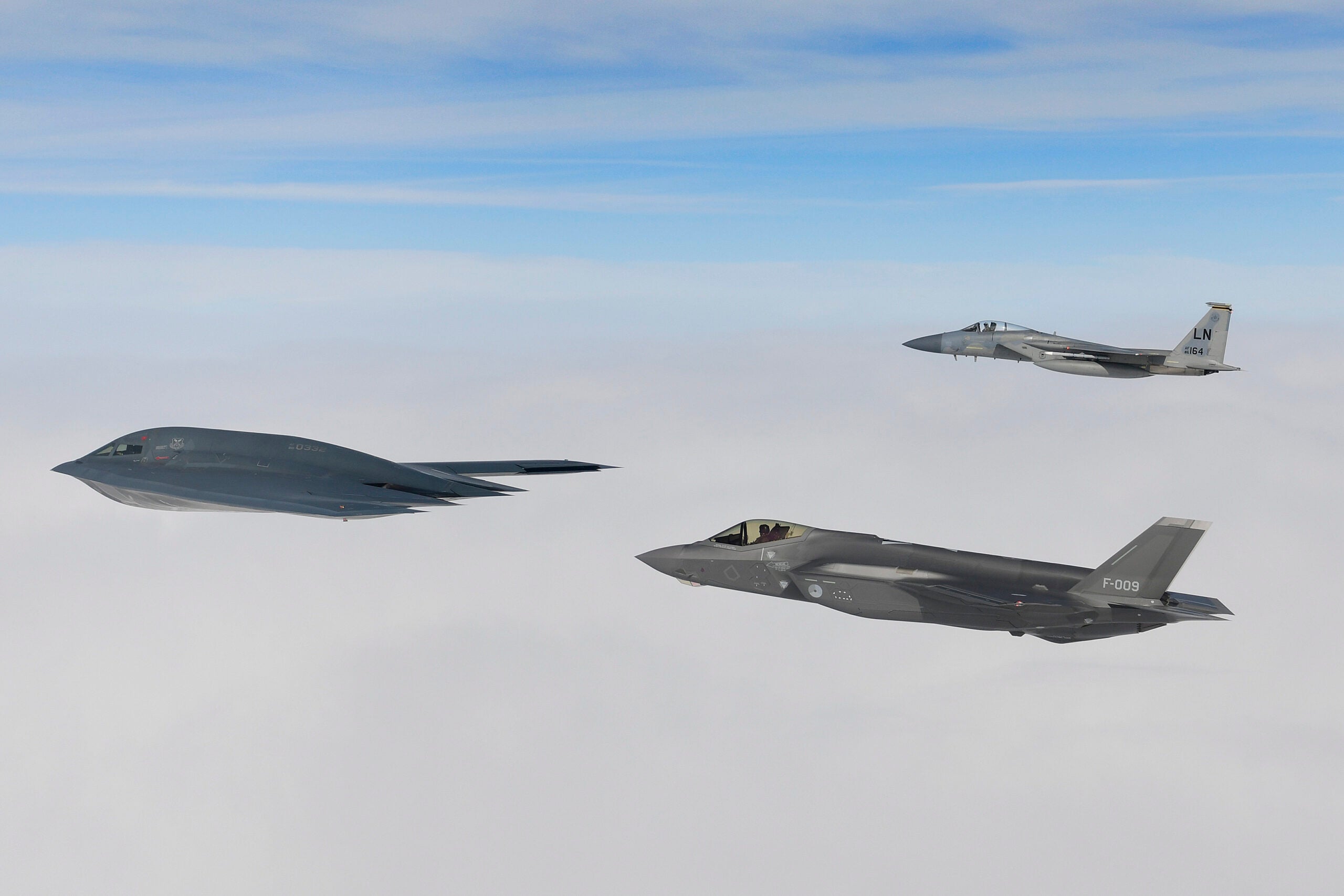 A B-2A Spirit bomber assigned to the 509th Bomb Wing, Royal Netherlands air force F-35A and U.S. F-15C Eagle assigned to the 48th Fighter Wing conduct aerial operations in support of Bomber Task Force Europe 20-2 over the North Sea March 18, 2020. Bomber missions provide opportunities to train and work with NATO allies and theater partners in combined and joint operations and exercises. (U.S. Air Force photo/ Master Sgt. Matthew Plew)