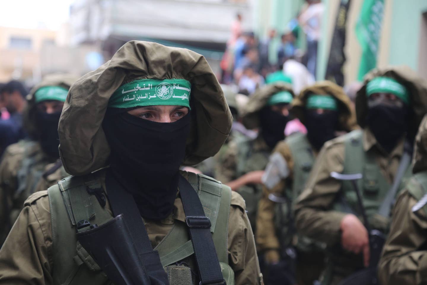 Members of the Islamist movement Hamas' military wing Al-Qassam Brigades during the funeral of six of their comrades who were killed in an unexplained explosion the night before, in Deir al-Balah in the central Gaza strip on May 6, 2018. <em>Photo by Majdi Fathi/NurPhoto</em>