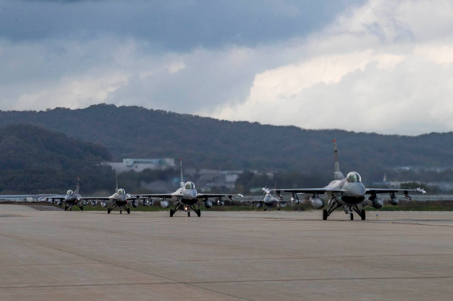 U.S. Air Force F‐16 Fighting Falcons assigned to the 36th Fighter Squadron prepare to take off at Osan Air Base. <em>U.S. Air Force</em>