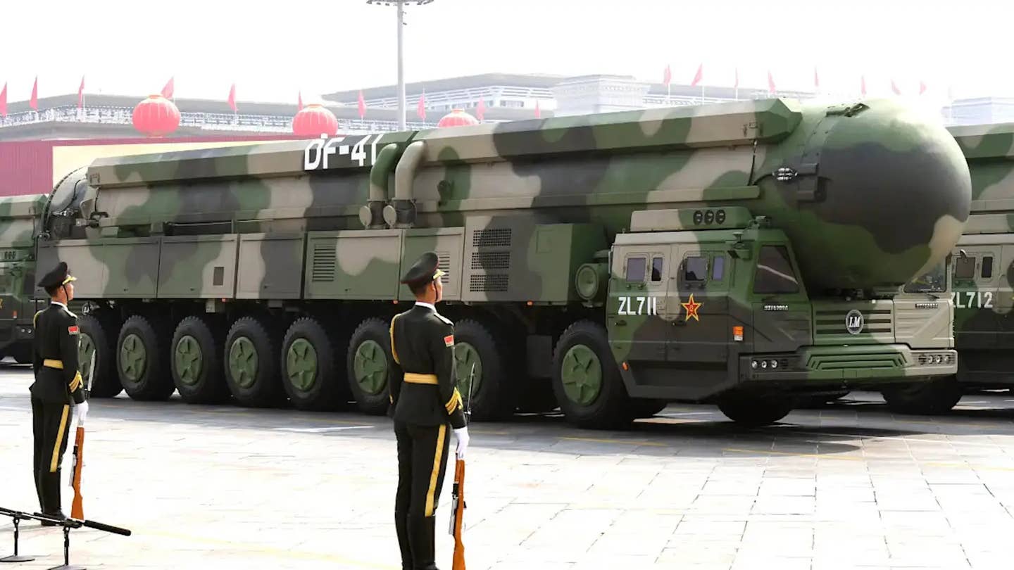Road-mobile transporter-erector-launchers for the DF-41, China's newest IBCM, on parade. <em>Kyodo via AP</em>