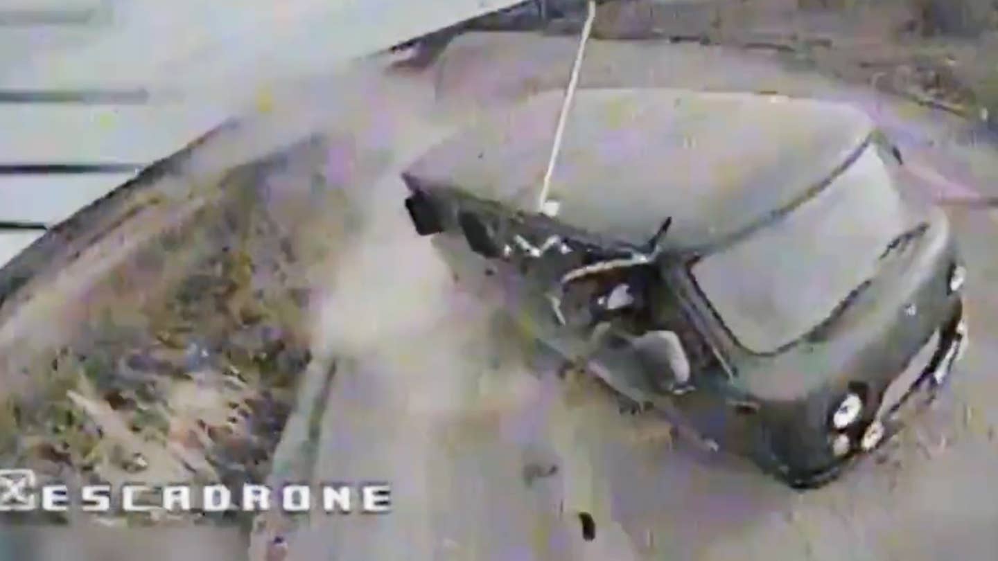 A first-person view drone races to destroy a Russian Bukhanka van in Ukraine.