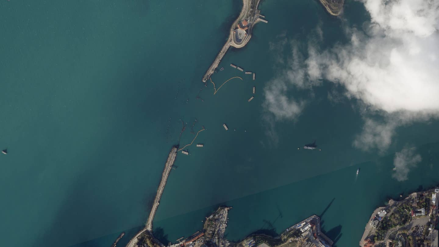 A Planet Labs satellite image taken Nov. 11 shows how an array of booms and barges designed to protect Sevastopol Harbor looked before yesterday's massive storm. <em>PHOTO © 2023 PLANET LABS INC. ALL RIGHTS RESERVED. REPRINTED BY PERMISSION</em>