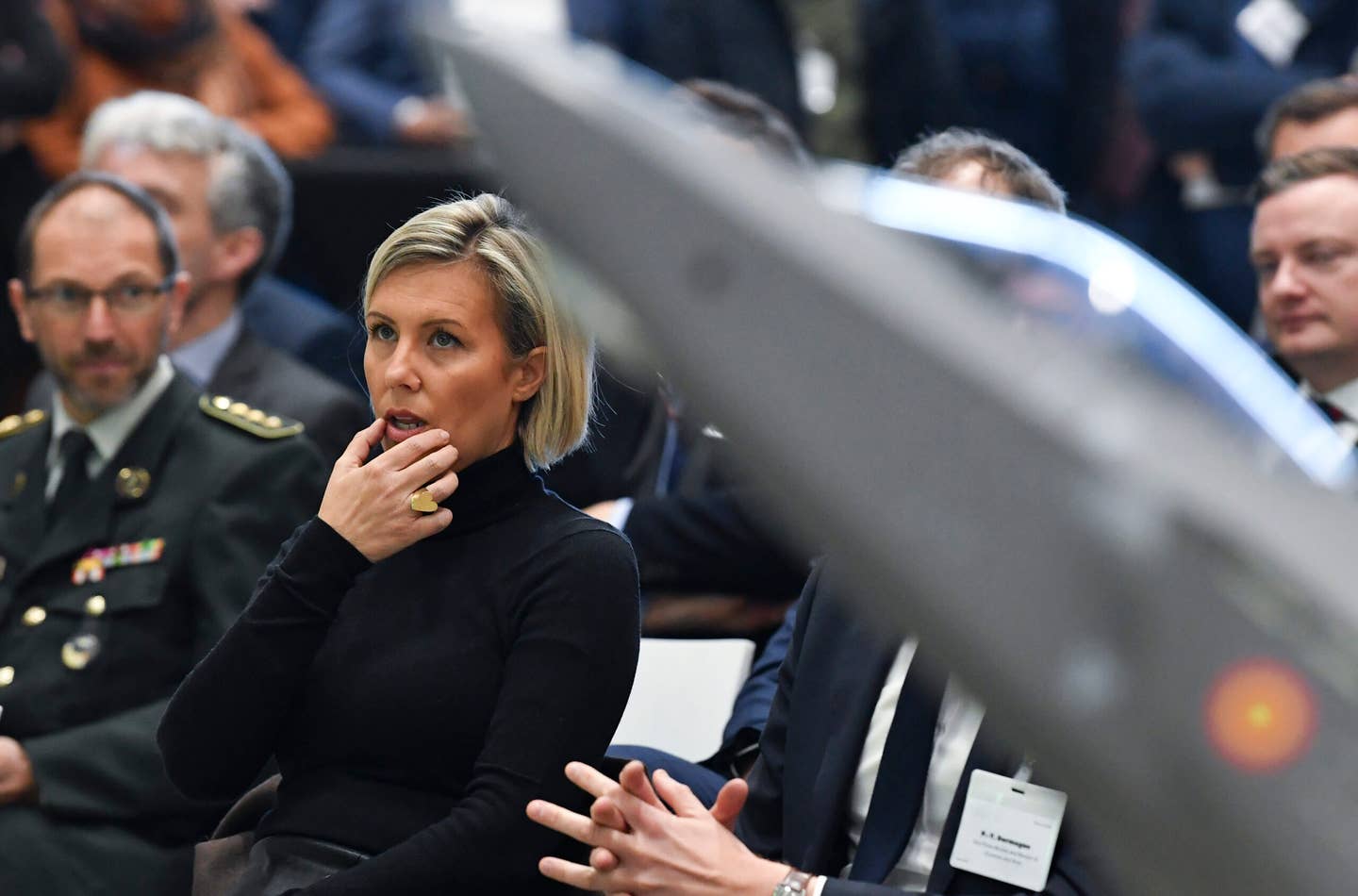 Belgian Minister of Defense Ludivine Dedonder is pictured during the inauguration ceremony at a new SABCA production hall for the horizontal tailplane of the F-35 fighter aircraft, in Lummen, on March 10, 2022. <em>Photo by JOHN THYS/BELGA MAG/AFP via Getty Images</em>