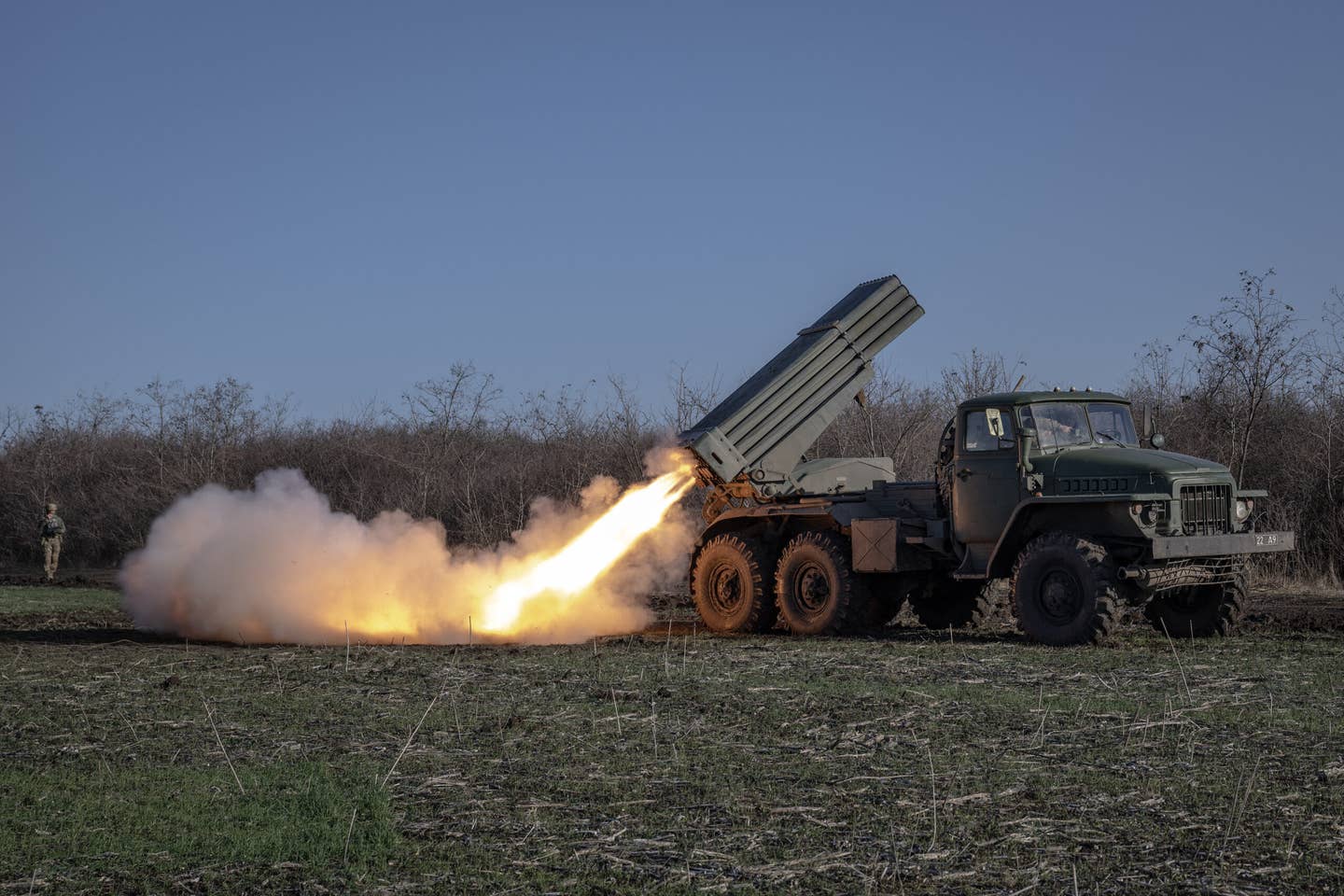 Ukrainian soldiers fire rocket artillery from a BM-21 Grad in the direction of Avdiivka in the Donetsk region, Ukraine, on November 28, 2023. <em>Photo by Ozge Elif Kizil/Anadolu via Getty Images</em>