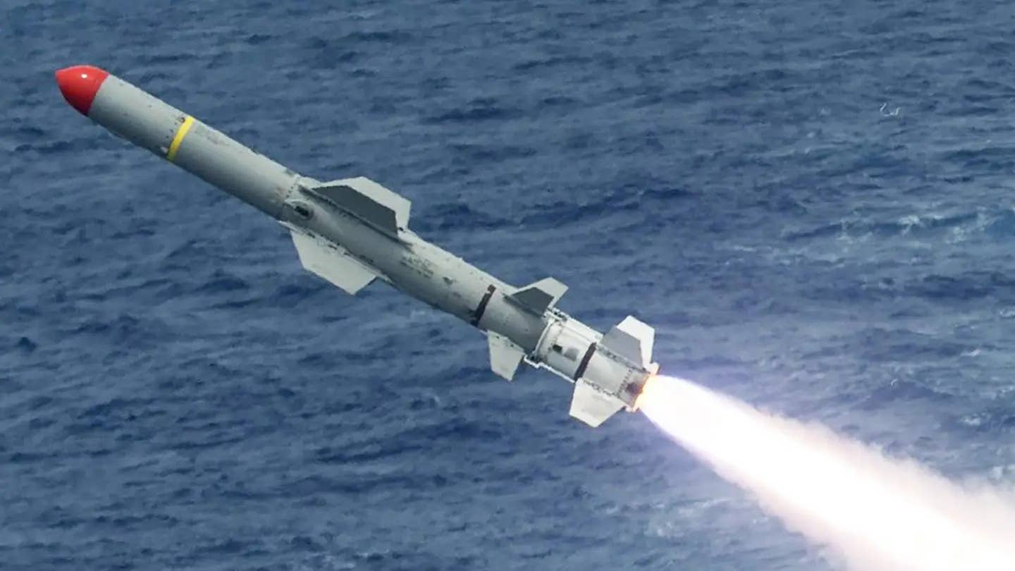 An RGM-84 Harpoon at the moment of launch. <em>USN</em>