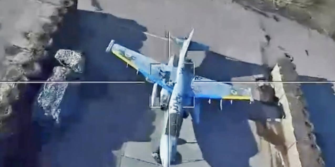 View of Su-25 attack jet decoy soon through optics of a Lancet loitering munition.