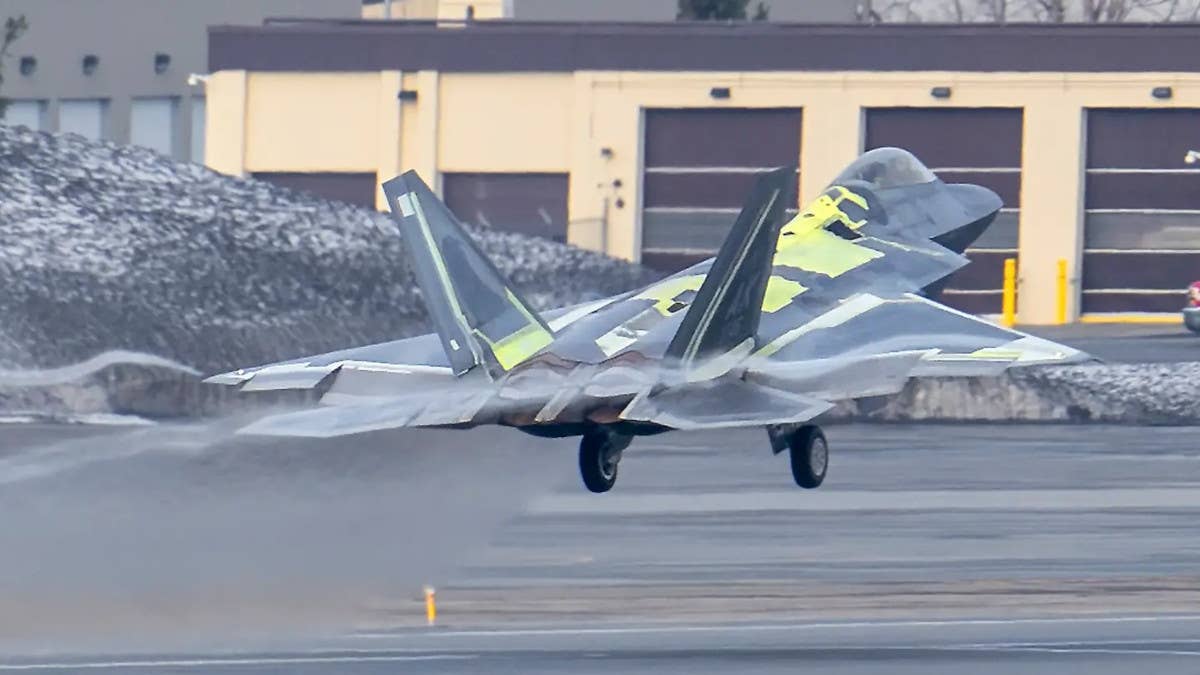 F-22 Raptor serial number 07-4146, which made a belly landing at Naval Air Station Fallon in Nevada in 2018, is seen here during initial flight testing earlier this year following extensive repairs. <em>USAF</em>