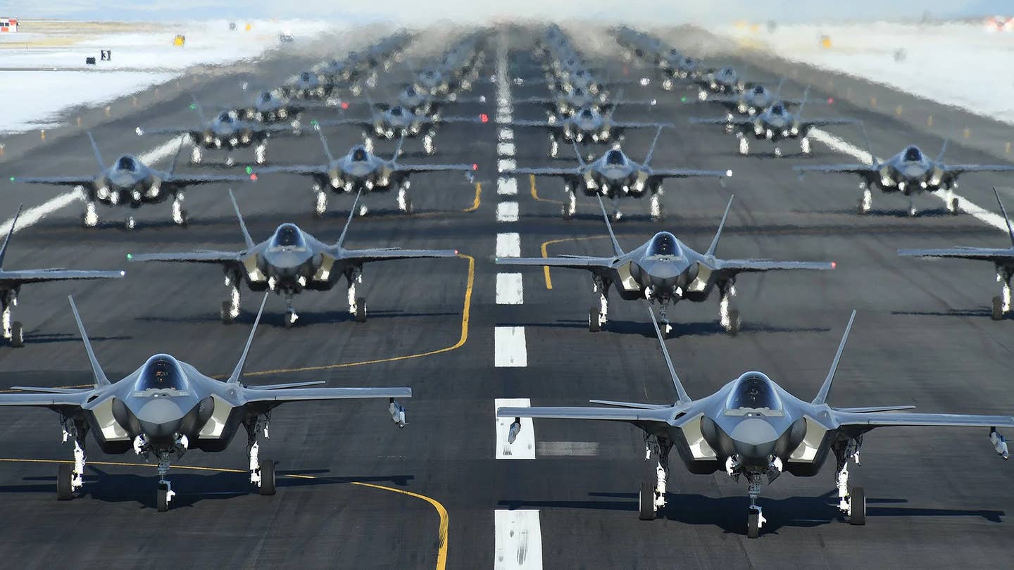 Dozens of F-35As lined up at Hill Air Force Base for an "Elephant Walk" readiness exercise in 2020. <em>USAF</em>