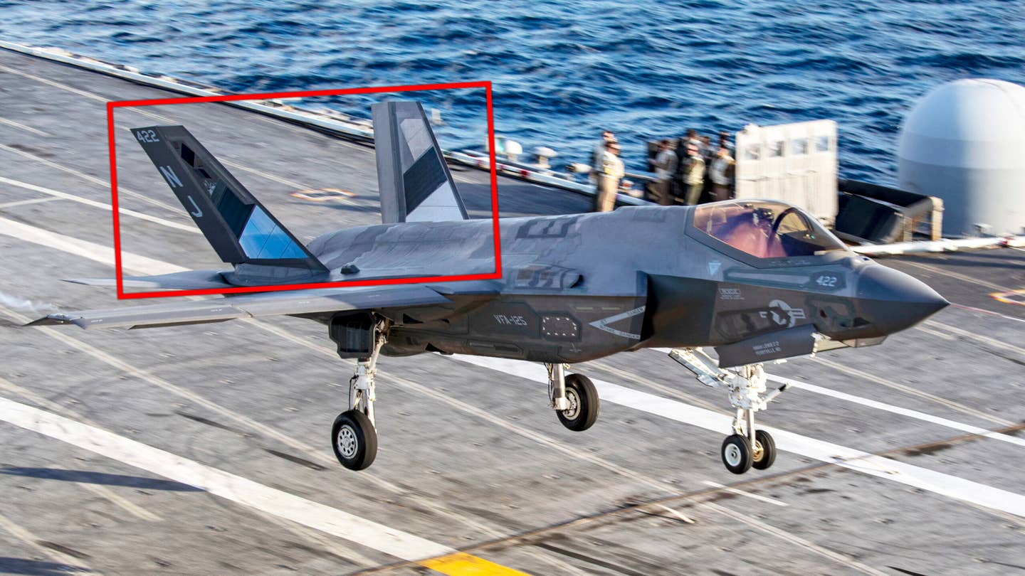 F-35C lands aboard the carrier with mirror coating on its tails.