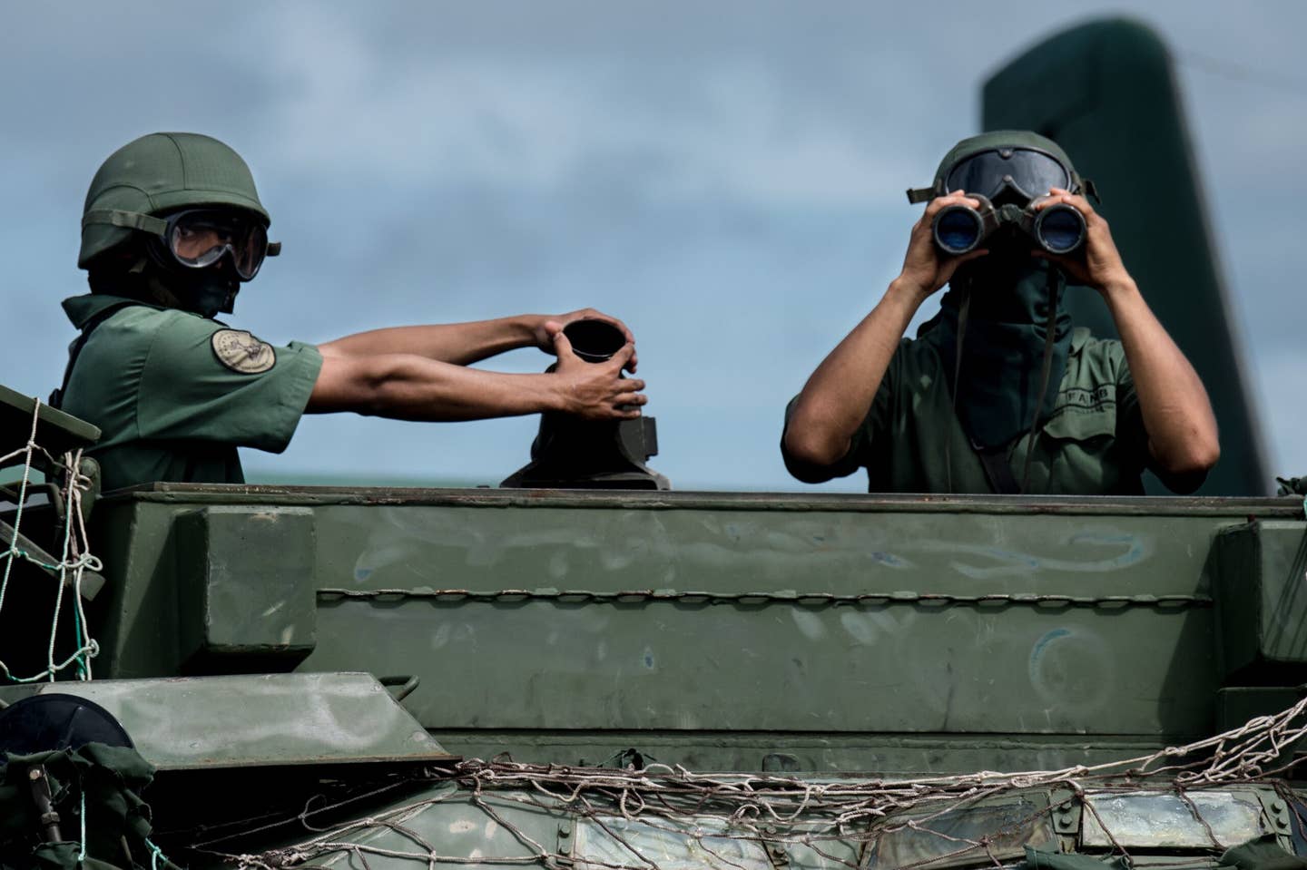 Members of the Venezuelan Army take part in a military parade in Tumeremo, Bolivar State, in Venezuela, about 56 miles from the border with Guyana, on July 21, 2015. <em>FEDERICO PARRA/AFP via Getty Images</em>