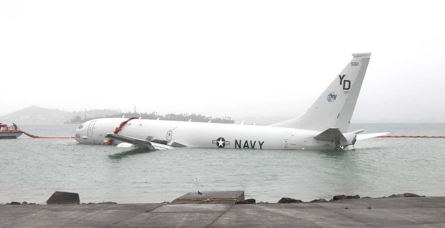 The P-8A from VP-4 sitting in Kaneohe Bay on November 20 after the mishap. <em>USN</em>