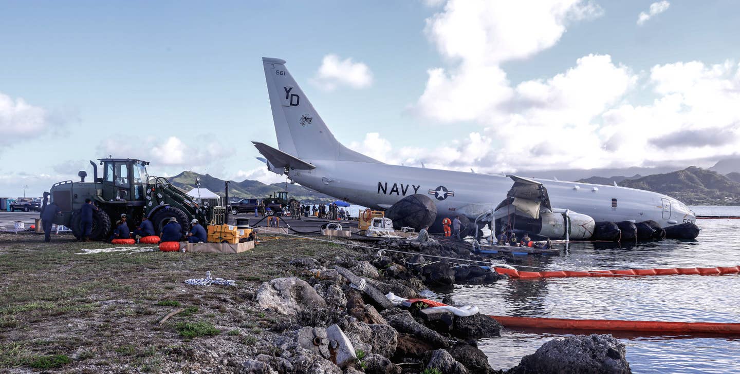 The P-8A seen partially recovered on Saturday, December 2. <em>USN</em>