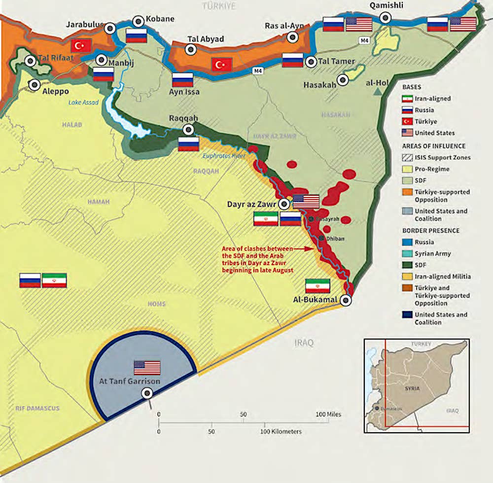 A map showing the general dispositions of US and other forces in Syria as of September 2023. The Rumalyn Landing Zone is roughly in the area covered by the Russian and US flags in the northeastern tip of the country. <em>DOD</em>