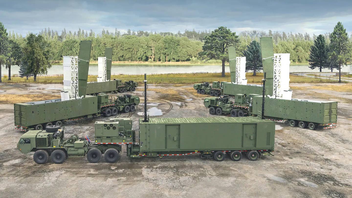 Components of an Army Typhon battery, including four trailer-mounted launchers and another trailer with a mobile command post. <em>US Army</em>