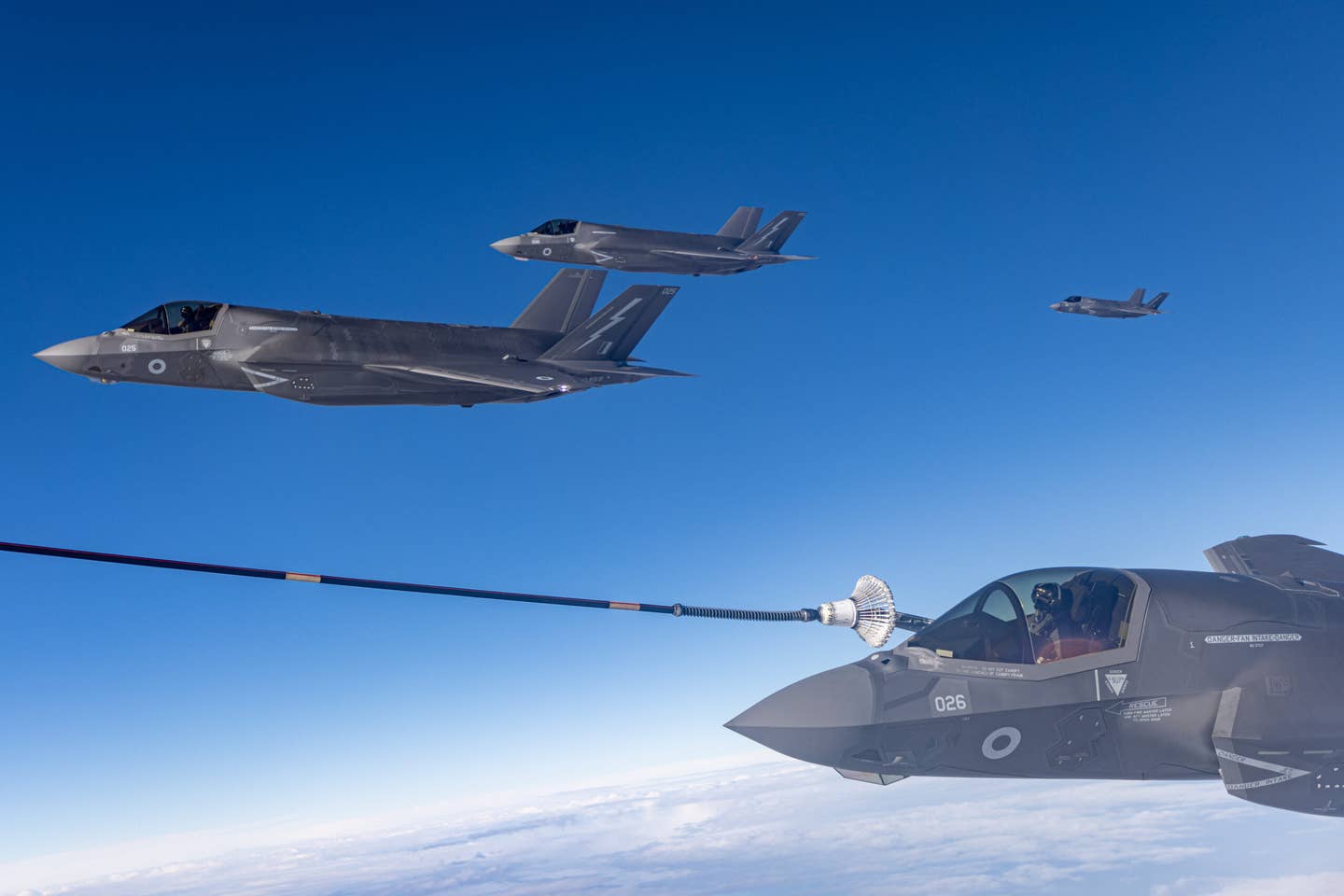 A Royal Air Force F-35B is refueled by a Voyager tanker over the Baltic Region. These jets were part of the Finnish-led Exercise Ruska 23. <em>Crown Copyright</em>