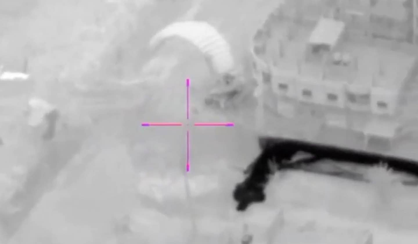 The Guided Supply parachute system glides toward Israeli troops in Khan Yunis (IDF video screencap)