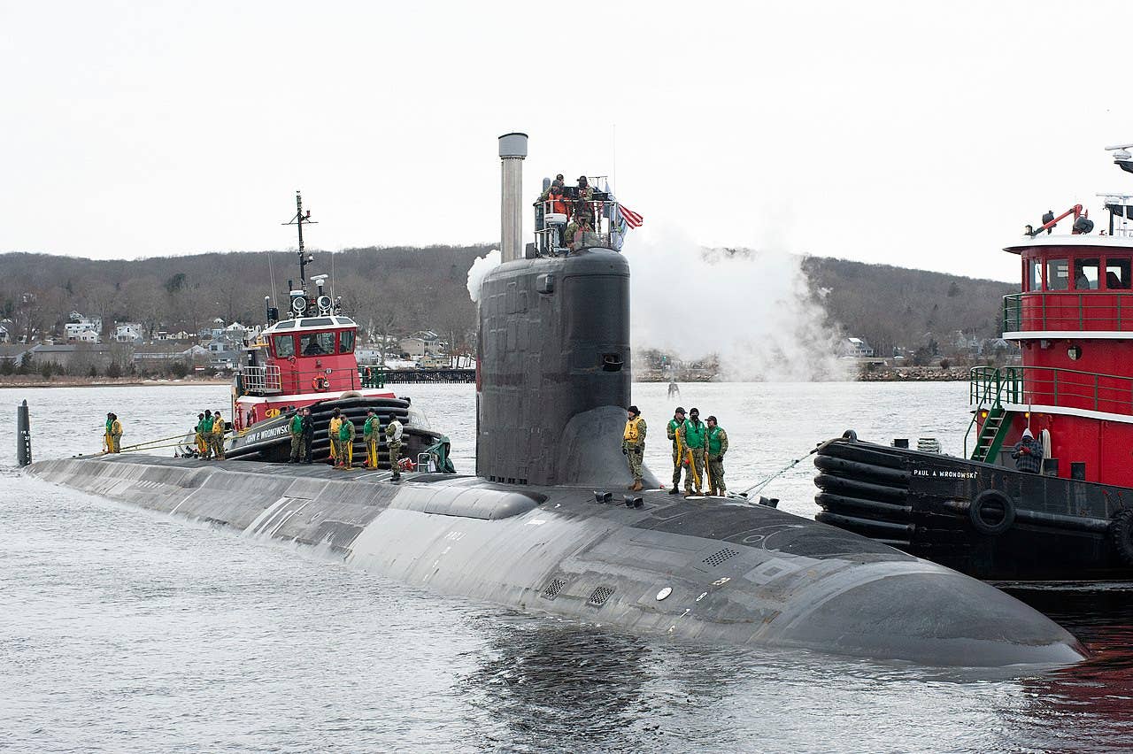USS <em>Oregon</em> at Submarine Base New London in Groton, Connecticut in 2022. <em>USN</em>