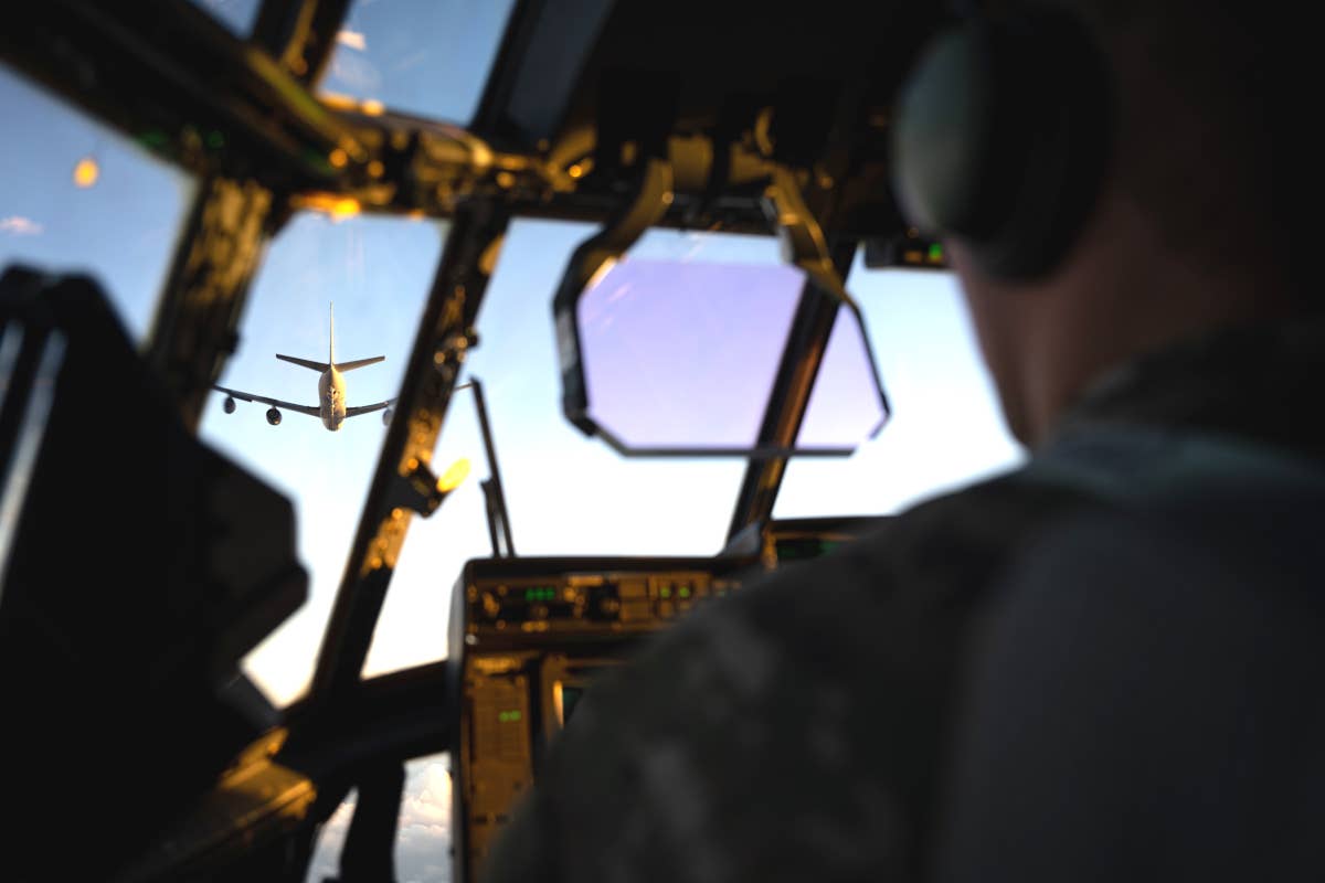 A view from inside the AC-130J Ghostrider gunship taking part in the training over the Caribbean on December 7, 2023, as it approaches a KC-135 tanker to refuel. <em>USAF</em>