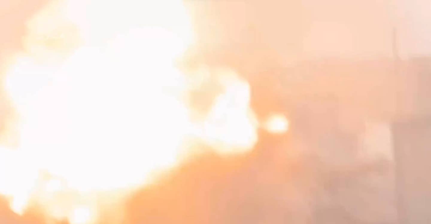 What may be a direction blast indicative of a Trophy system firing that is seen in the clip showing the attack on the stationary Merkava. <em>capture via X</em>