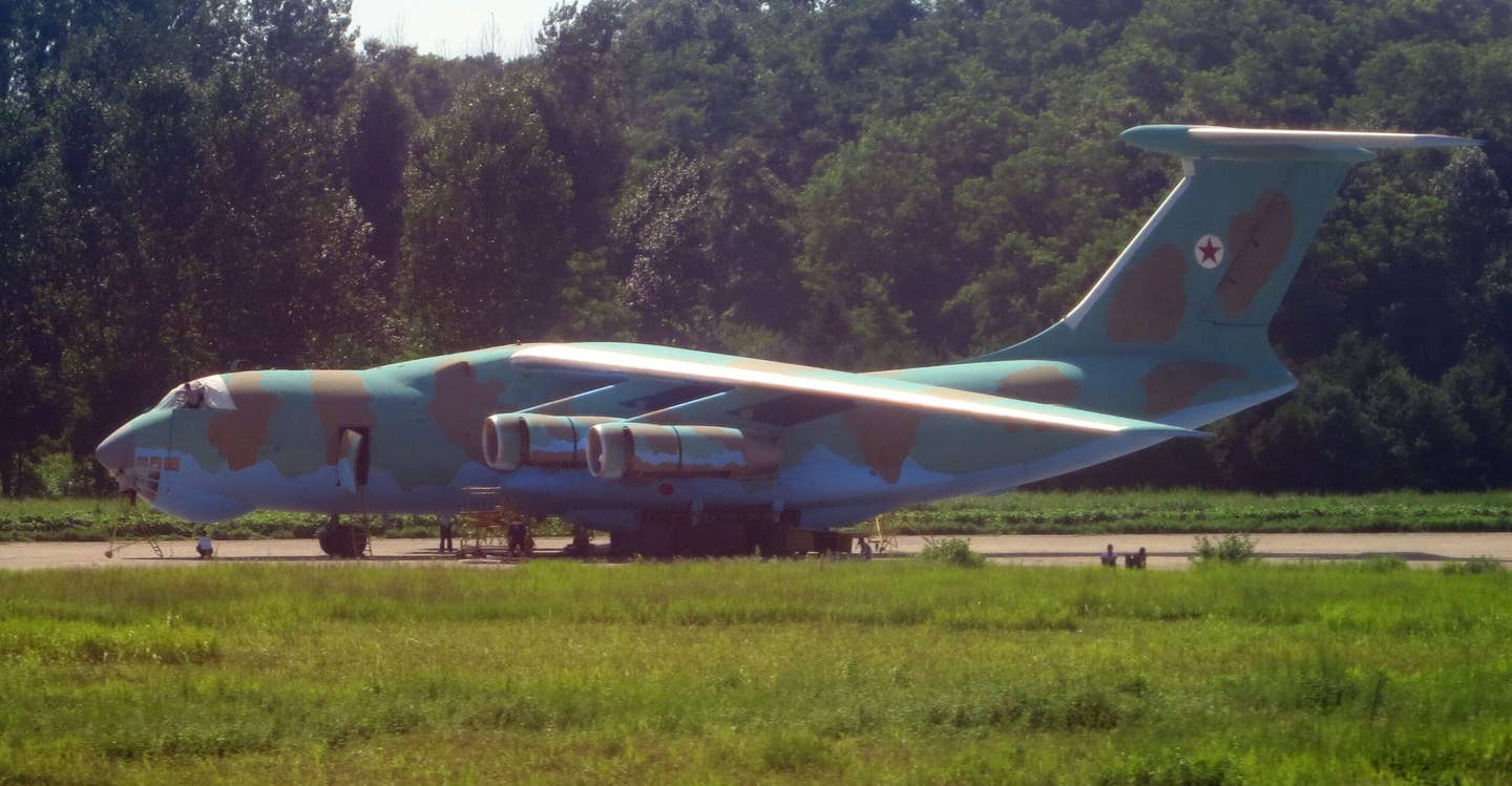 An Air Koryo Ilyushin Il-76 in temporary camouflage colors at Pyongyang in July 2013. <em>Stefan Krasowski/Wikimedia Commons</em>