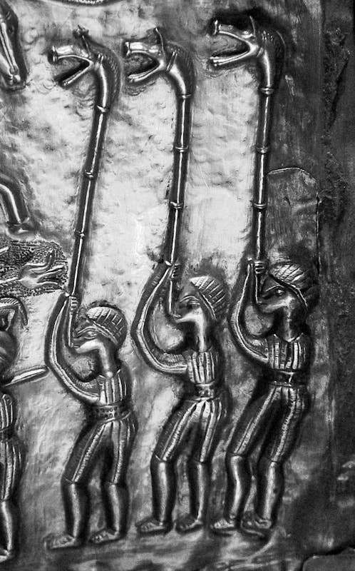 Carnyx players depicted on the cauldron found at Gundestrup, Himmerland, Jutland, Denmark. <em>Bloodofox via Wikimedia Commons, CC-BY-SA-3.0</em>