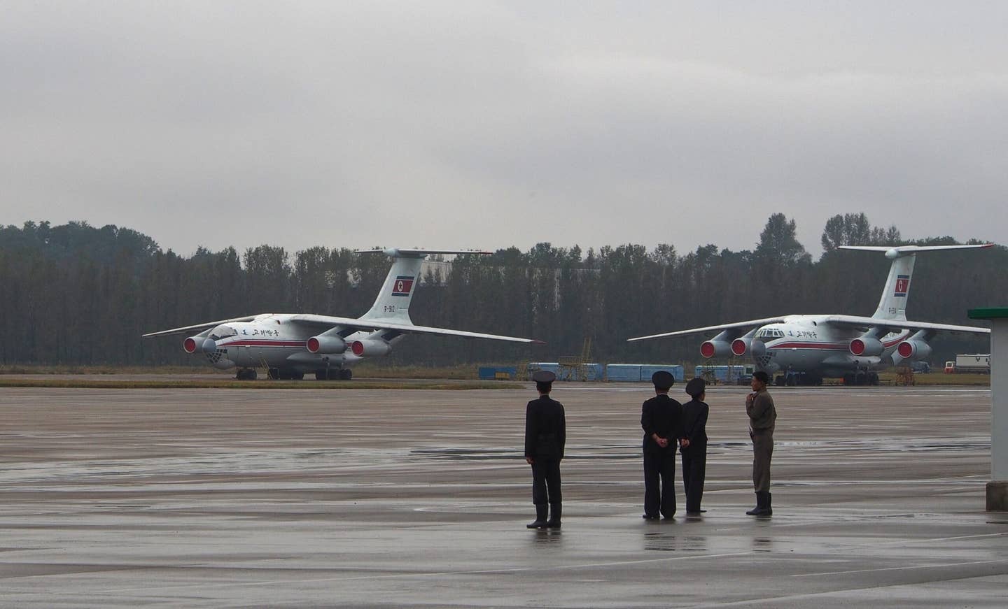 Two of the three North Korean Il-76s, photographed at Pyongyang International Airport in October 2013. <em>Clay Gilliland/Wikimedia Commons</em>