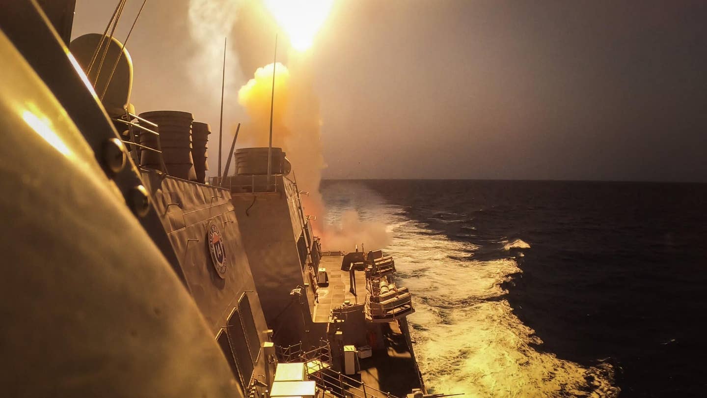 RED SEA (Oct. 19, 2023) The Arleigh Burke-class guided-missile destroyer USS Carney (DDG 64) fires a Standard Missile (SM) 2 to defeat a combination of Houthi missiles and unmanned aerial vehicles in the Red Sea, Oct. 19, 2023. Carney is deployed to the U.S. 5th Fleet area of operations to help ensure maritime security and stability in the Middle East region. (U.S. Navy photo by Mass Communication Specialist 2nd Class Aaron Lau)
