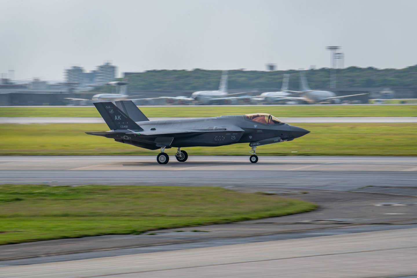A U.S. Air Force F-35A assigned to the 354th Fighter Wing at Eilson Air Force Base, Alaska, lands at Kadena Air Base, Japan, on March 28, 2023, for a rotational deployment. <em>U.S. Air Force photo by Airman 1st Class Alexis Redin</em>