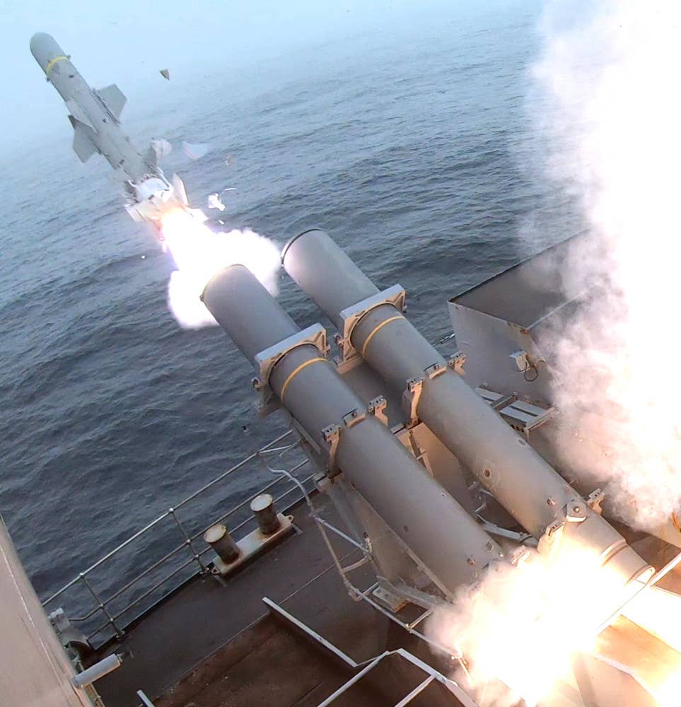 The Royal Navy's Type 23 frigate HMS Westminster fires a Harpoon anti-ship missile during an exercise in 2023. <em>USN</em>