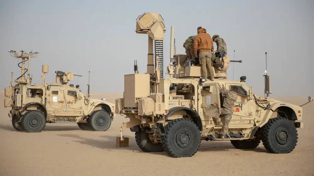 The Coyote-armed M-LIDS vehicle, in front, along with an example of the other M-LIDS configuration. <em>US Army</em>