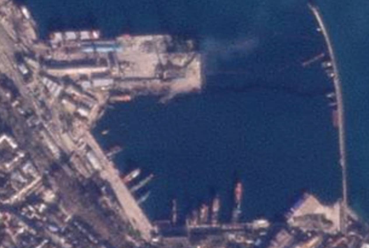 A low-resolution satellite image of Feodosia taken on December 26 showing the complete destruction of the  <em><em>Novocherkassk</em></em>. UTS-150 is also visible largely submerged. <em>PHOTO © 2023 PLANET LABS INC. ALL RIGHTS RESERVED. REPRINTED BY PERMISSION </em>
