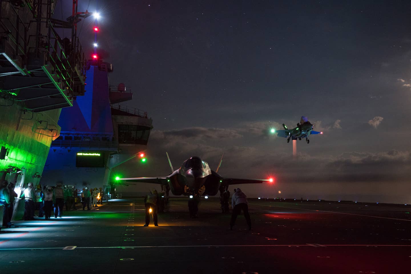F-35Bs conduct night flying operations aboard HMS <em>Queen Elizabeth</em>. <em>U.S. Navy <em>photo</em> by Dane Wiedmann</em>