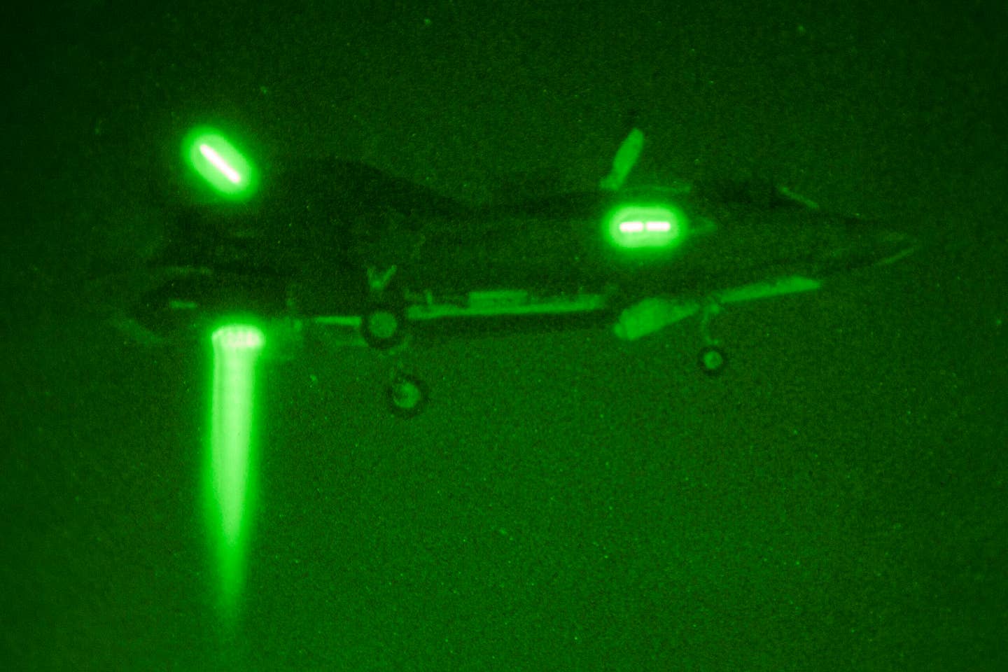 F-35B test aircraft BF-4 hovers in the darkness during a night test flight at NAS Patuxent River, Maryland, December 13, 2012. <em>Lockheed Martin</em>
