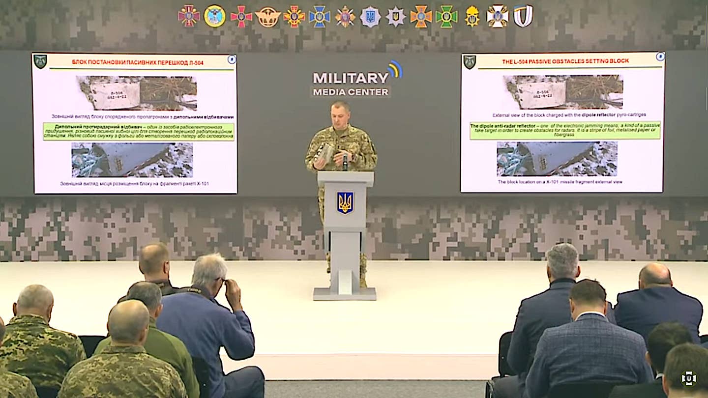 A screen grab from a video recording of the February 2023 press conference about the captured Kh-101 during the segment about the missile's countermeasures capabilities. <em>Armed Forces of Ukraine capture</em>