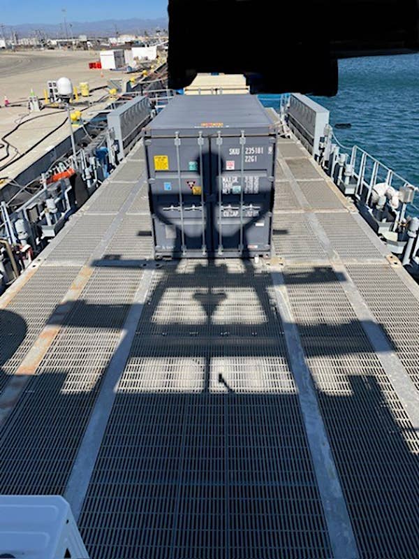 A view of Nomad's large open rear deck from the auction listing. Note also that whatever is moored behind the ship has been blacked out. <em>GSA</em>