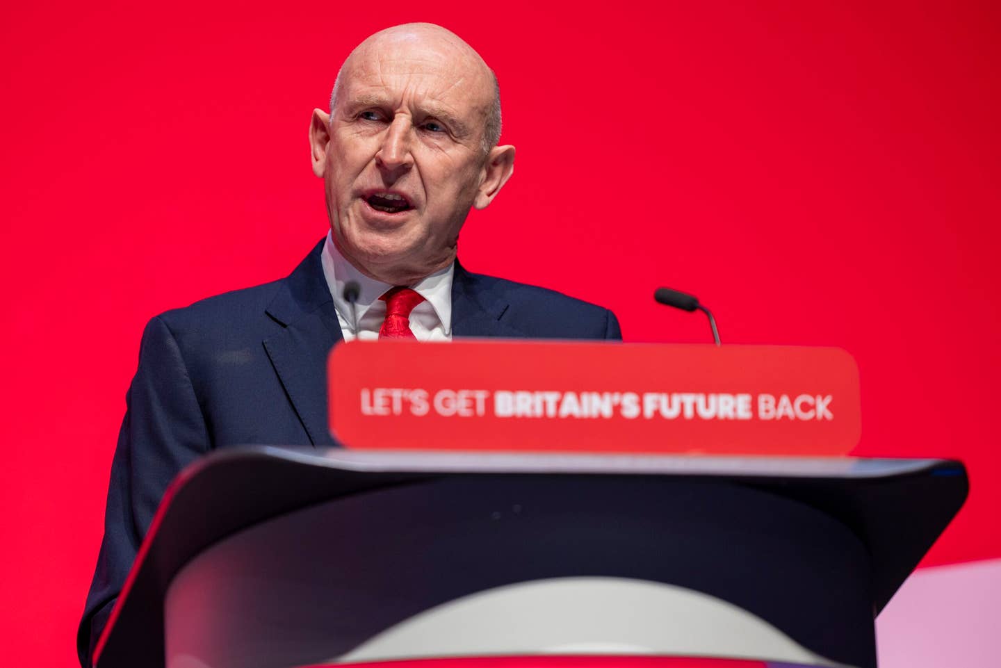 John Healey MP speaking on the second day of the Labour Party conference, October 9, 2023, in Liverpool, U.K.<em> Photo by Andrew Aitchison / In Pictures via Getty Images</em>