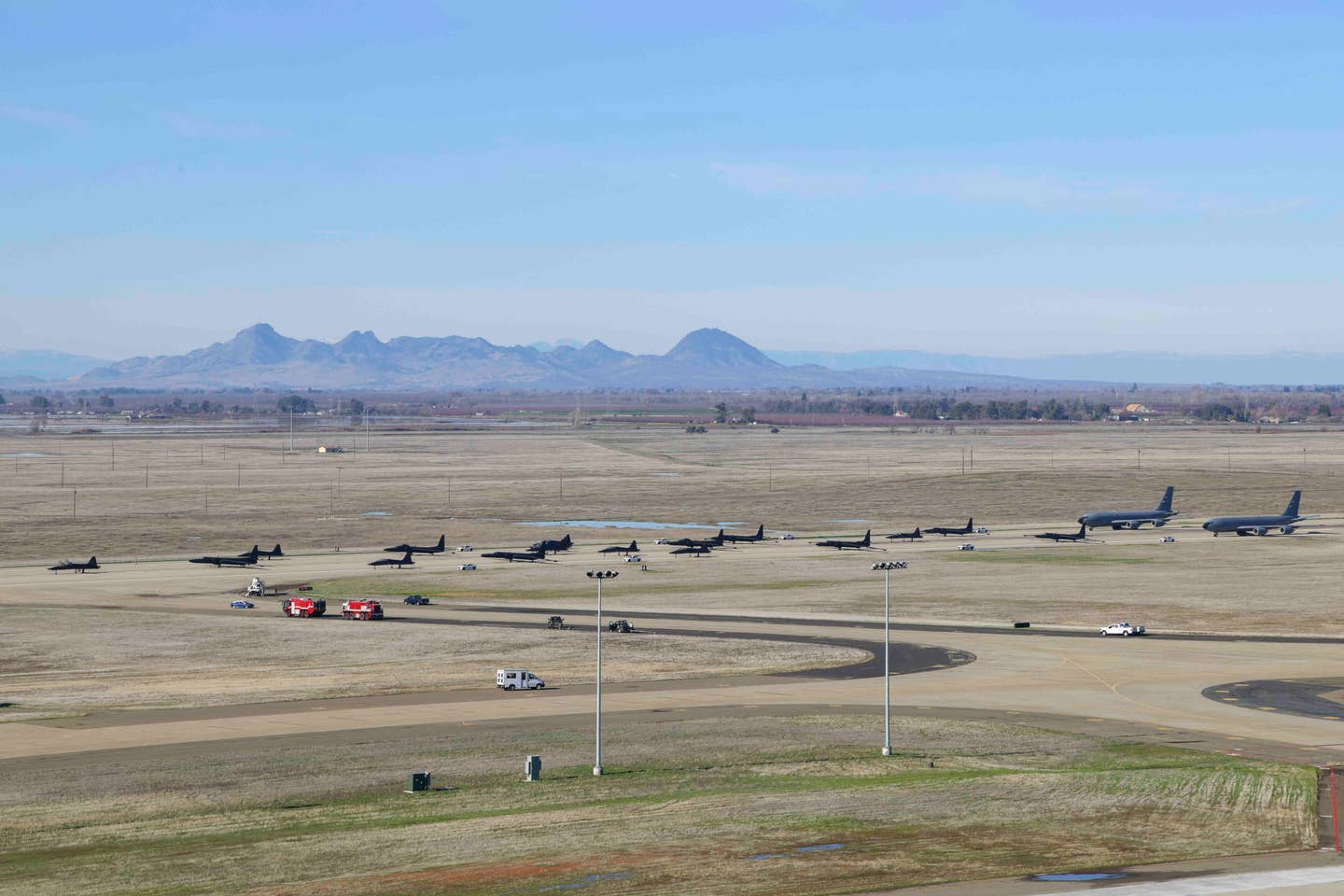 U.S. Air Force T-38 Talons from the 1st Reconnaissance Squadron, U-2 Dragon Ladies and chase cars from the 99th Reconnaissance Squadron, and KC-135R Stratotankers from the 940th Air Refueling Wing conduct an elephant walk on Beale Air Force Base, California, Jan. 4, 2023. The elephant walk showcased a display of joint airpower between the 9th Reconnaissance Wing and 940th hosted at Beale. (U.S. Air Force photo by Staff Sgt. Frederick A. Brown)