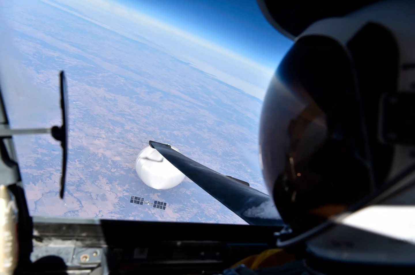 A U.S. Air Force U-2 Dragon Lady pilot looks down at the suspected Chinese surveillance balloon as it drifts over the Central Continental United States on February 3, 2023. The balloon was shot down the following day.&nbsp;<em>DOD</em>