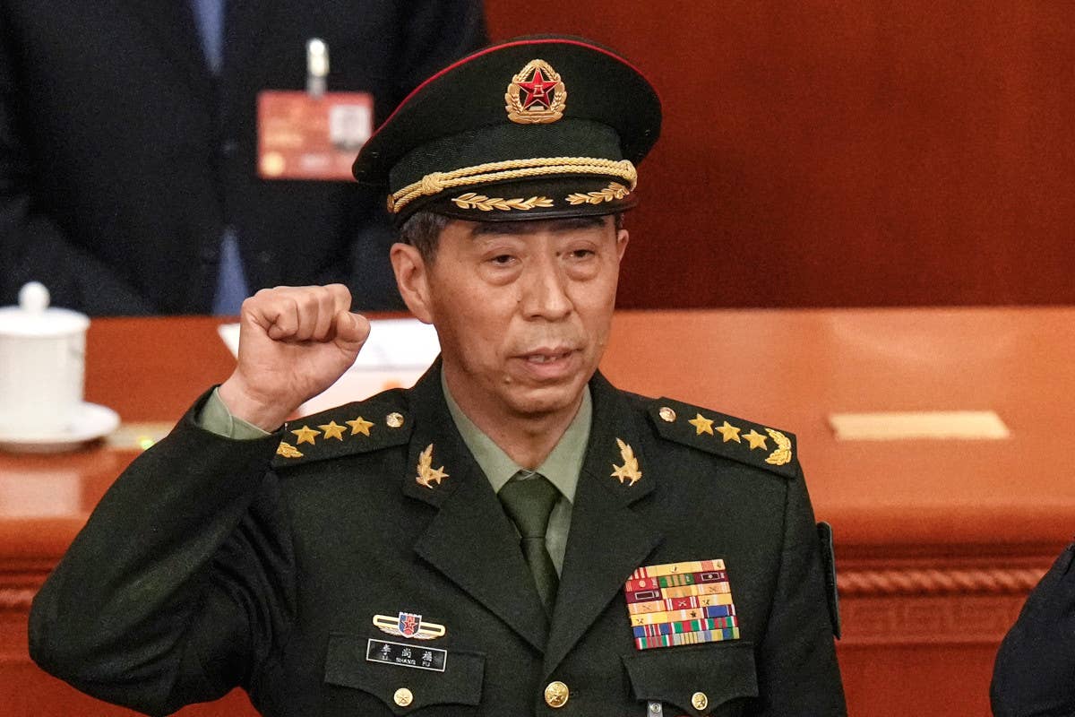 Newly elected Chinese Defense Minister Gen. Li Shangfu takes his oath during a session of China's National People's Congress (NPC) at the Great Hall of the People in Beijing on March 12, 2023. <em>AP Photo/Andy Wong</em>