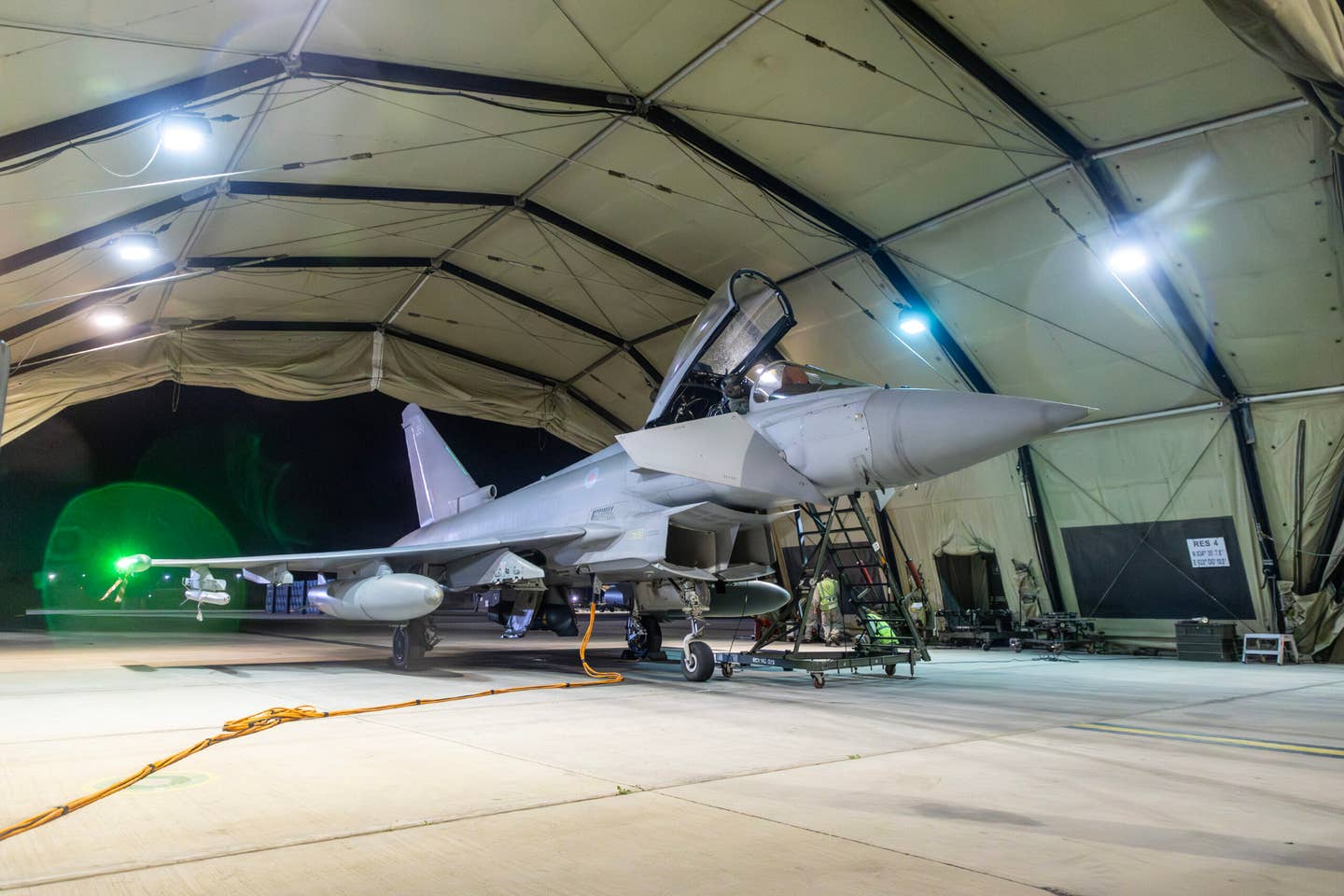 A U.K. Royal Air Force Typhoon FGR4 returns to its shelter at RAF Akrotiri, Cyprus, on January 12, 2024, following a strike mission on Houthi rebels. <em>Photo by MoD Crown Copyright via Getty Images</em>