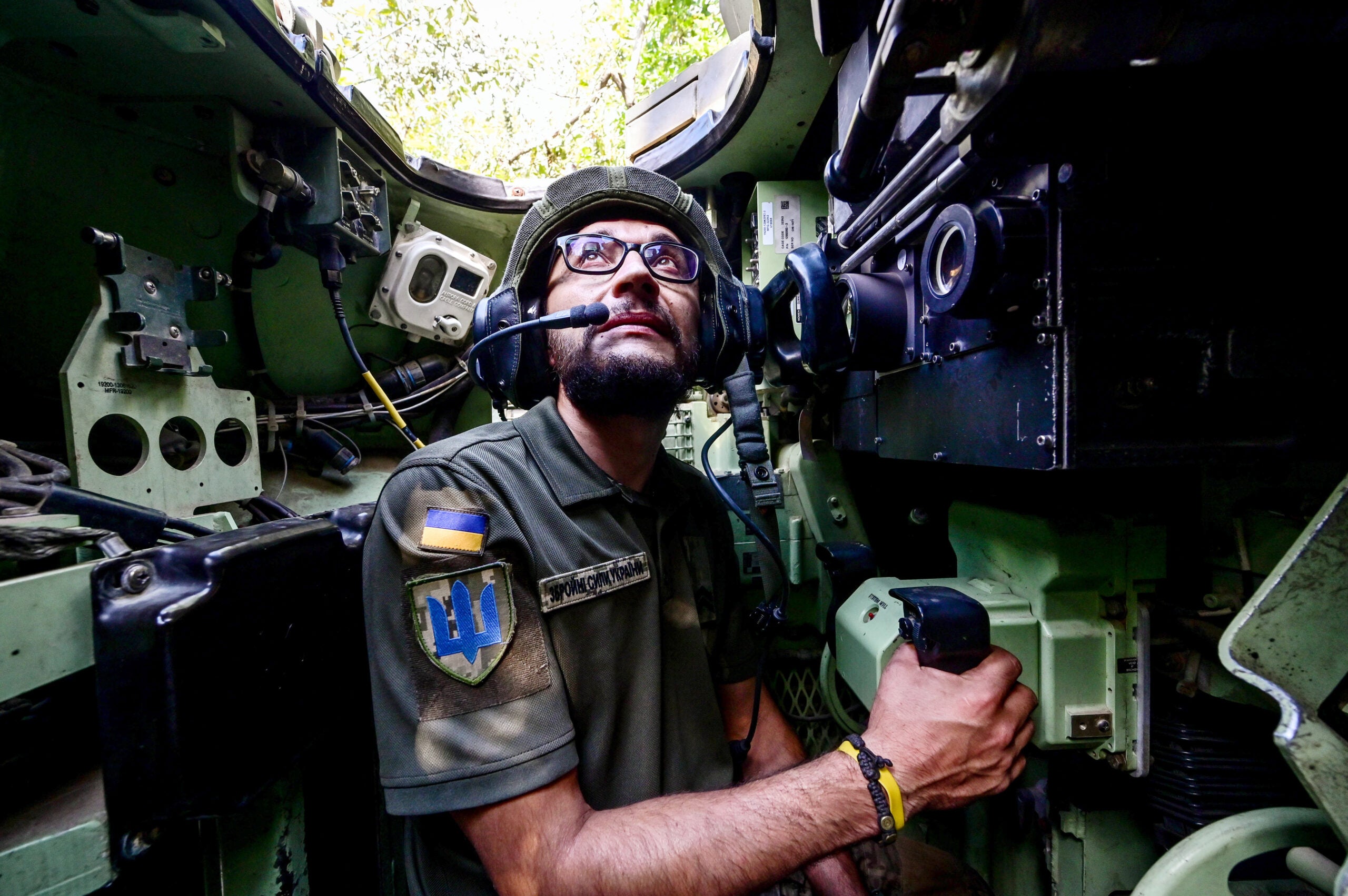 UKRAINE - SEPTEMBER 6, 2023 - Gunner 'Molfar', 39, a Bradley IFV crew member of the 47th Magura Mechanized Brigade who took part in the fighting to liberate Robotyne village from Russian invaders, is pictured inside the vehicle, Zaporizhzhia direction, southeastern Ukraine. NO USE RUSSIA. NO USE BELARUS. (Photo by Ukrinform/NurPhoto via Getty Images)