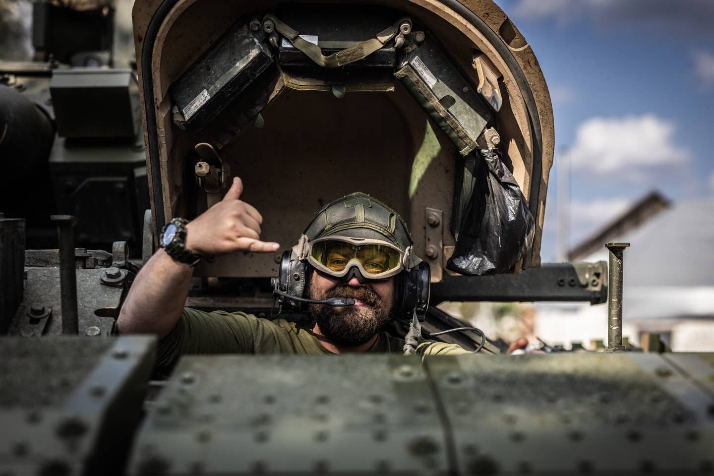 17 September 2023, Ukraine, Orichiw: The driver of a Bradley Fighting Vehicle (BFV) gestures in the frontline town of Orichiw. From their American armored personnel carrier, the crew reports heavy fighting. Photo: Oliver Weiken/dpa (Photo by Oliver Weiken/picture alliance via Getty Images)