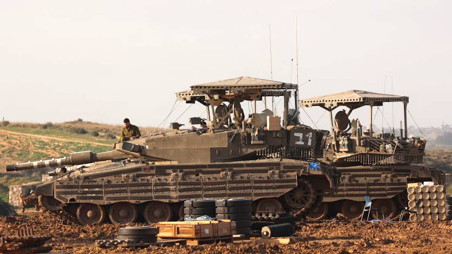 A look at the sides of two Merkava Mk 3s seen recently with the additional anti-magnet bomb stripping. <em>Gil Cohen Magen/Xinhua</em>