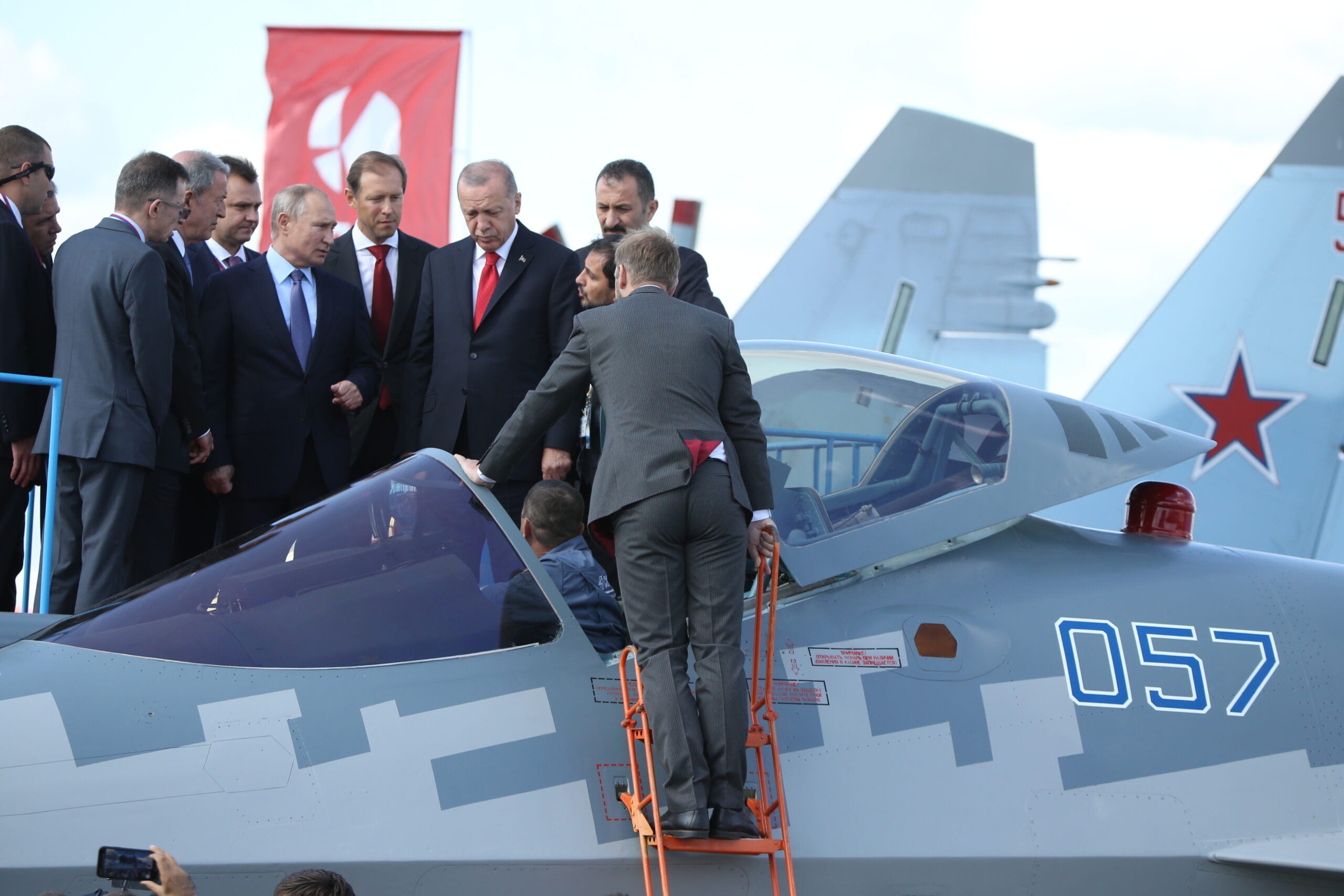 ZHUKOVSKY, RUSSIA - AUGUST 27 (RUSSIA OUT) Russian President Vladimir Putin (L) and Turkish President Recep Tayyip Erdogan (R) observe a new Sukoi SU-57 Jet Fighter while visiting the MAKS 2019 International Aviation and Space Show in Zhukovsky, 40 km. East of Moscow, Russia, August,27,2019. Erdogan is having a one-day visit to Russia. (Photo by Mikhail Svetlov/Getty Images)