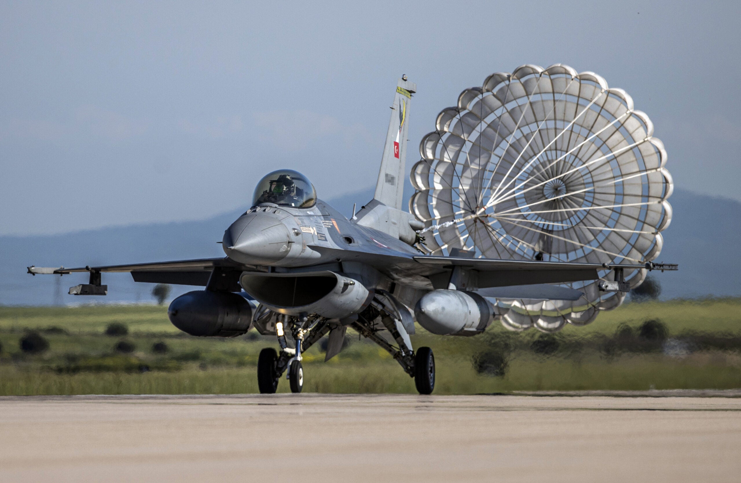 BALIKESIR, TURKIYE - MAY 22: Turkish Air Force F-16 fighter aircraft is seen during test flight in Balikesir, Turkiye on May 22, 2022. The 161st Fleet Command, the only fleet of the Turkish Air Force with two call names - coded as "Eagle" during the day and "Bat" at night - takes an active role in both the protection of the airspace in Aegean Region and the combat against terrorism. (Photo by Ali Atmaca/Anadolu Agency via Getty Images)