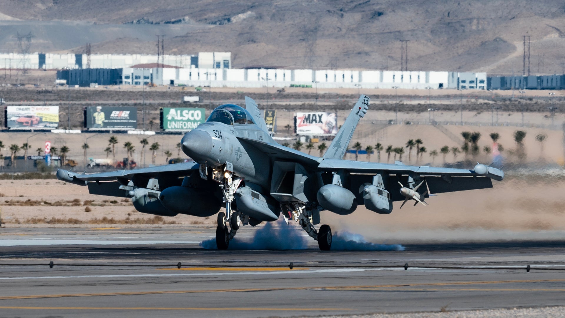 A U.S. Navy EA-18G Growler assigned to Naval Air Station Whidbey Island, Washington, arrives for Red Flag-Nellis 24-1 at Nellis Air Force Base, Nevada, Jan. 10, 2024. Participants conduct a variety of scenarios, including defensive counter air, offensive counter air suppression of enemy air defenses and offensive counter air-air interdiction. (U.S. Air Force photo by William R. Lewis)