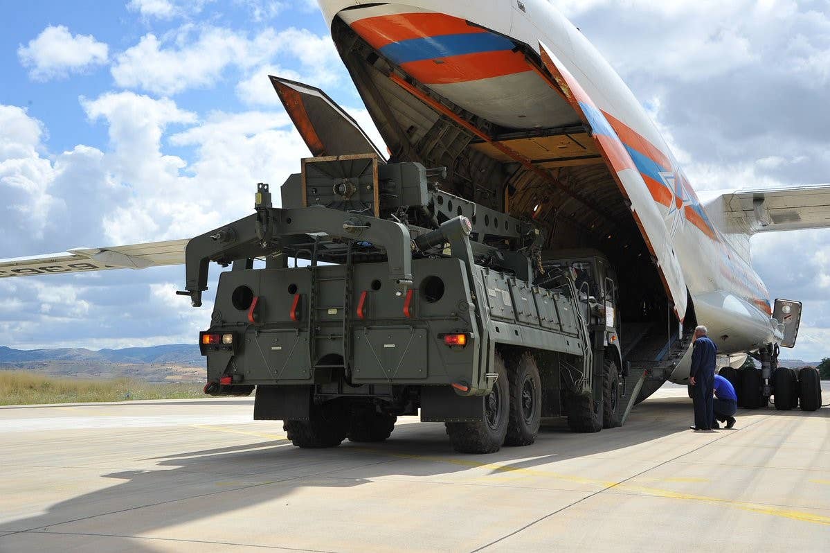 A Russian Il-76 transport aircraft, carrying the first batch of equipment for the S-400 missile defense system, arrives at the air base of Murted in Ankara, Turkey, on July 12, 2019. <em>Photo by Turkish National Defense Ministry/Handout/Anadolu Agency/Getty Images</em>