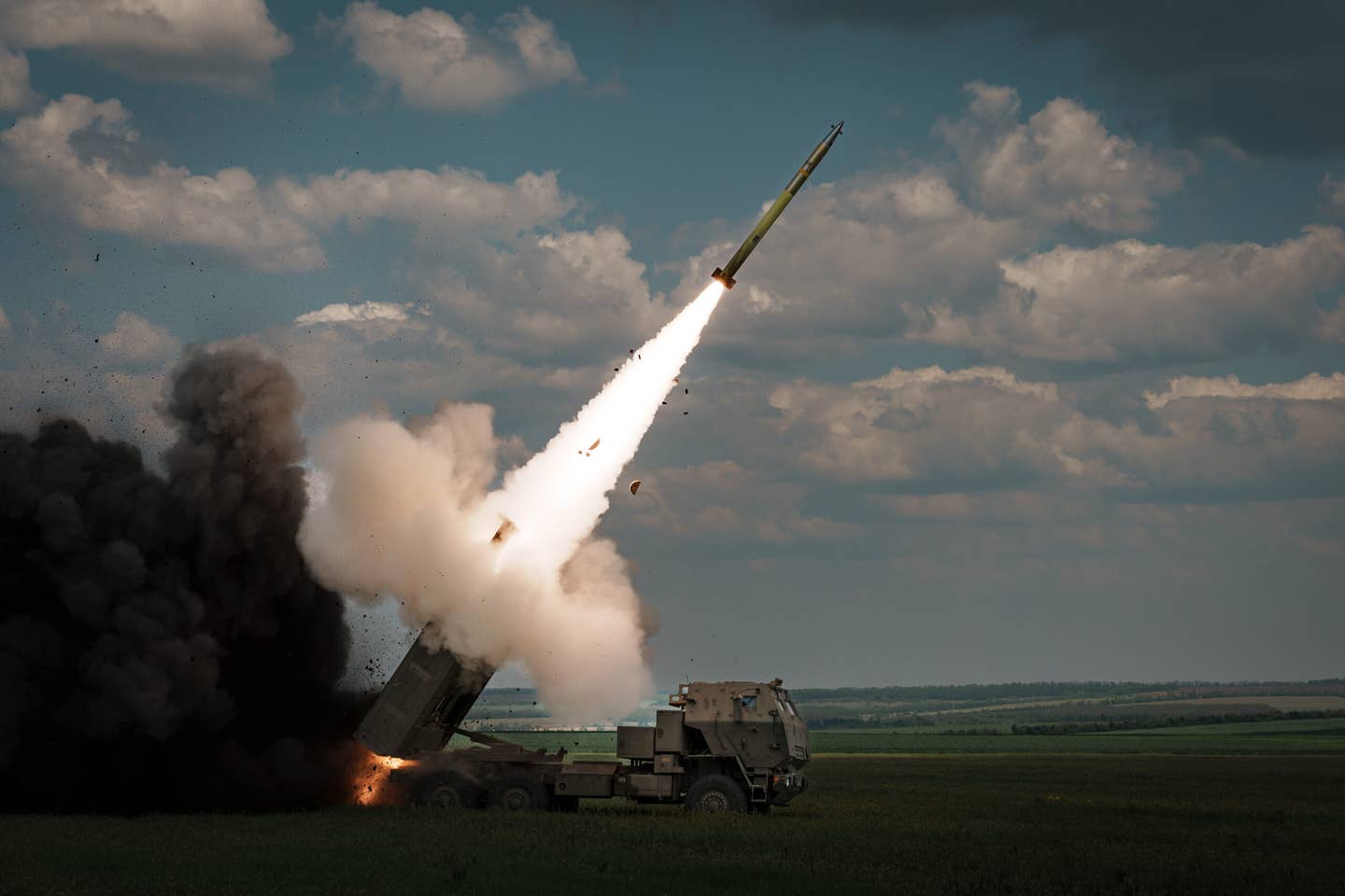 Guided Multiple Launch Rocket System munitions, like the one launched by this M142 HIMARS in service with Ukraine, cost more than twice as much as the one contained in a Ground Launched Small Diameter Bomb. (Photo by Serhii Mykhalchuk/Global Images Ukraine via Getty Images)
