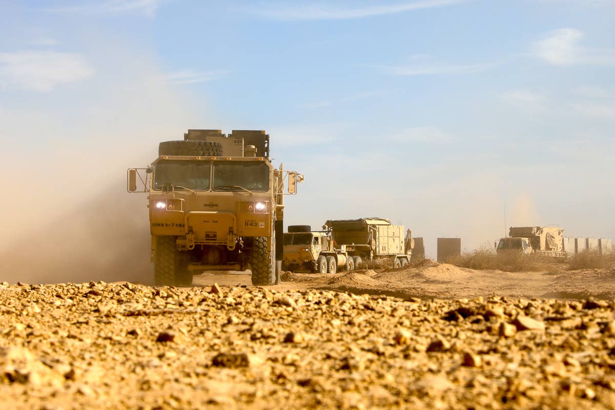Elements of a U.S. Army Patriot battery move into position at an undisclosed location in the Middle East in November 2023. <em>U.S. Army</em>